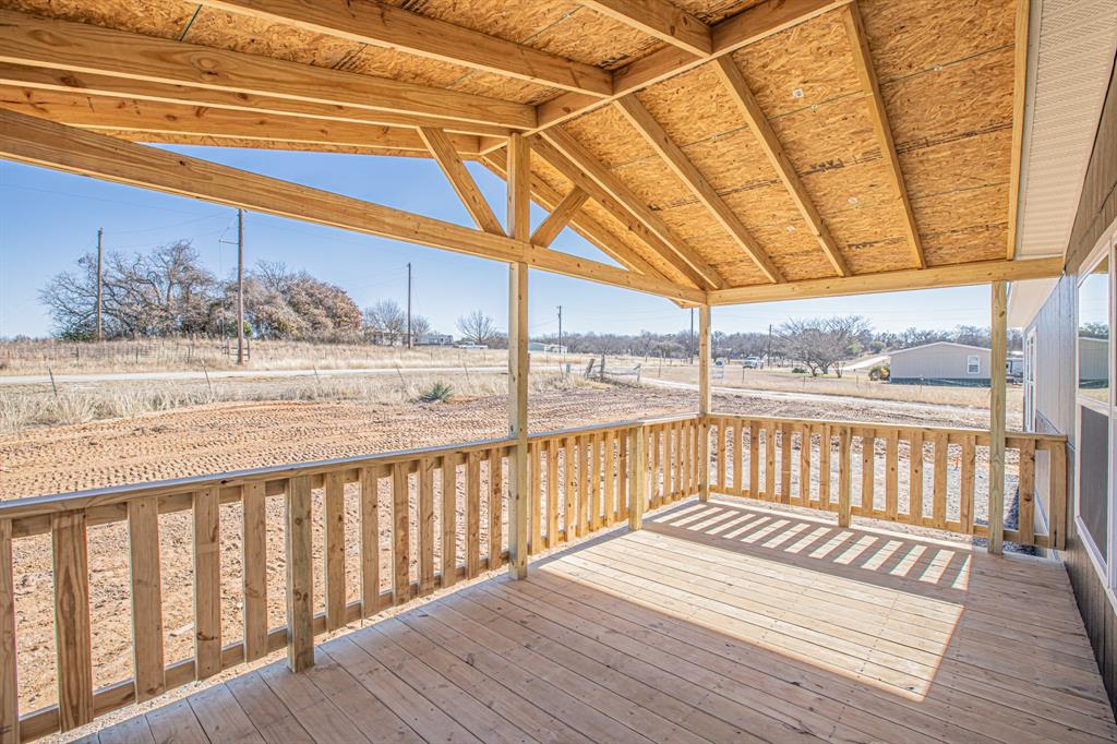 245 Lelon Lane Springtown, TX 76082 - Photo 4 of 37 a view of a roof deck