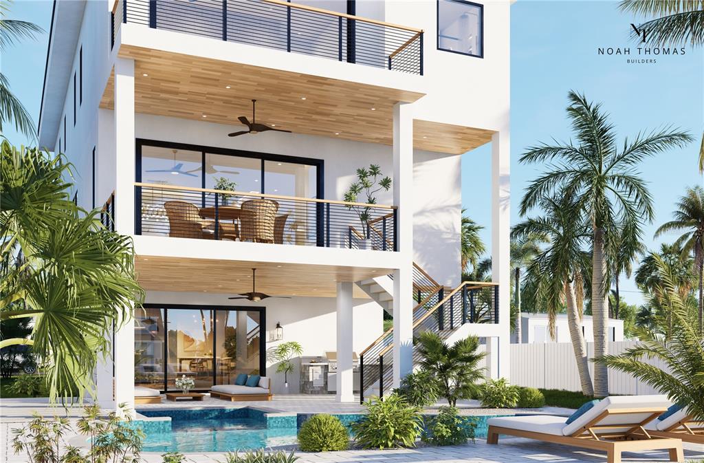 541 Normandy Road Madeira Beach, FL 33708 - Photo 3 of 9 a view of house with outdoor space and swimming pool