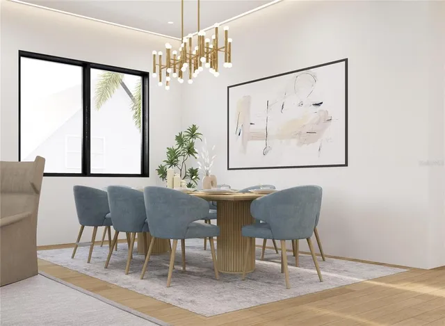 a dining room with furniture a rug and a painting