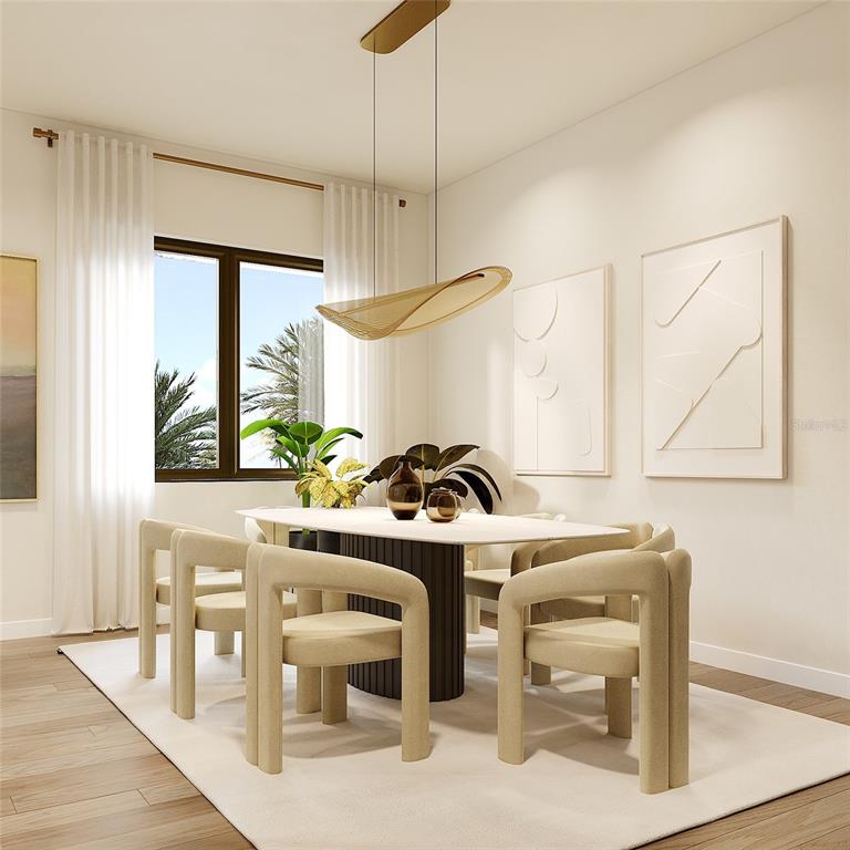 541 Normandy Road Madeira Beach, FL 33708 - Photo 7 of 9 a kitchen with a table and chairs in it