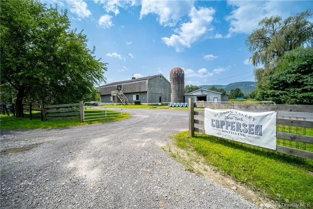 a view of a park with swings and slides