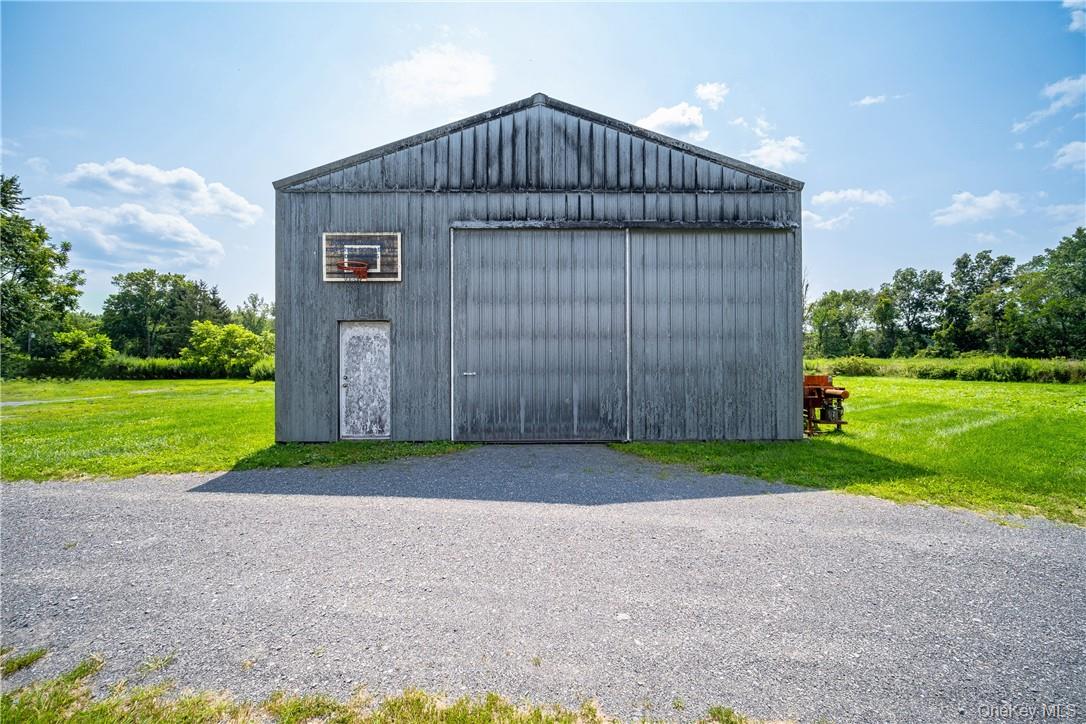 239 Springtown Road New Paltz, NY 12561 - Photo 26 of 36 a view of an house with a yard
