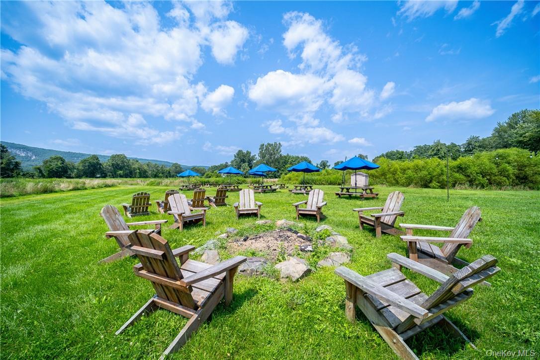 239 Springtown Road New Paltz, NY 12561 - Photo 28 of 36 a view of a big yard with lounge chairs