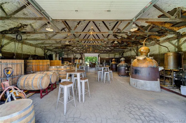 a view of a kitchen with furniture and a table