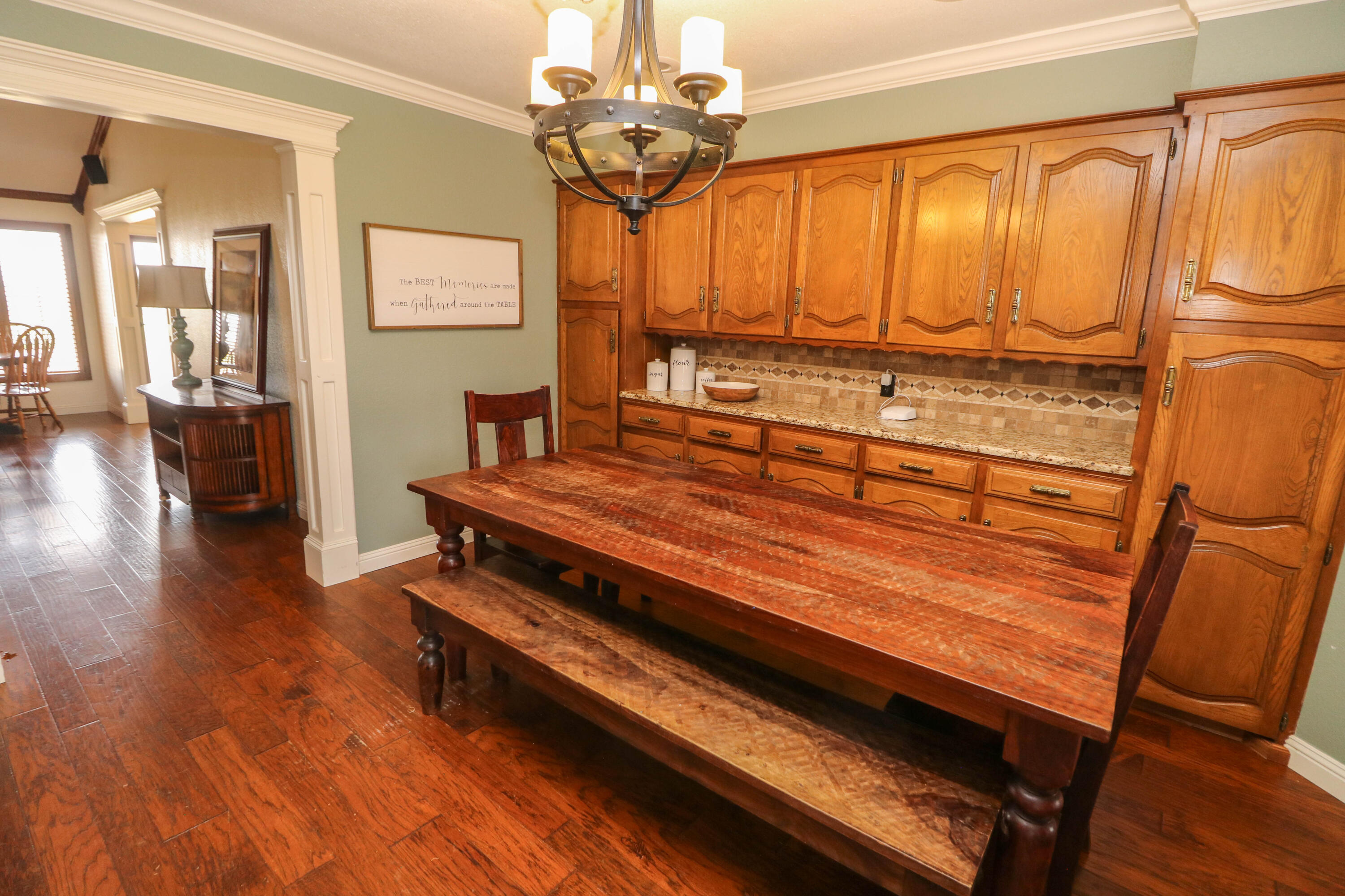 1740 Highway 70 Springlake, TX 79082 - Photo 10 of 39 a room with wooden floor table and chairs