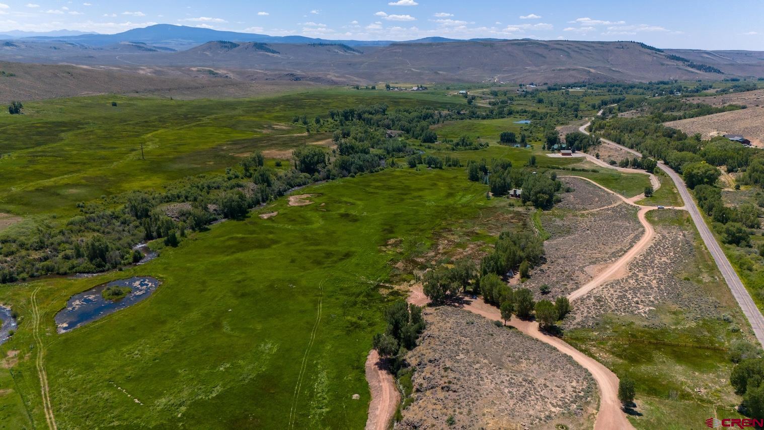 32 Bench Road Parlin, CO 81239 - Photo 13 of 34 a view of a lush green hillside and houses