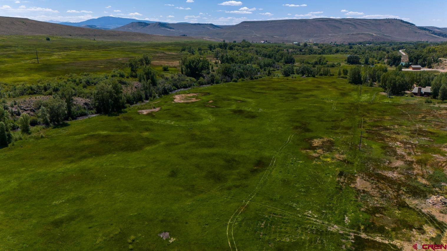 32 Bench Road Parlin, CO 81239 - Photo 15 of 34 a view of a lush green hillside and houses