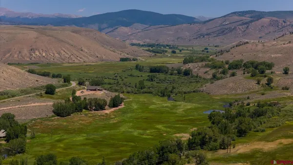 a view of a lush green field
