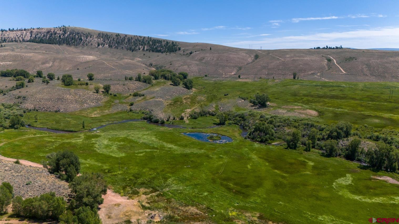 32 Bench Road Parlin, CO 81239 - Photo 3 of 34 a view of a lush green hillside and houses