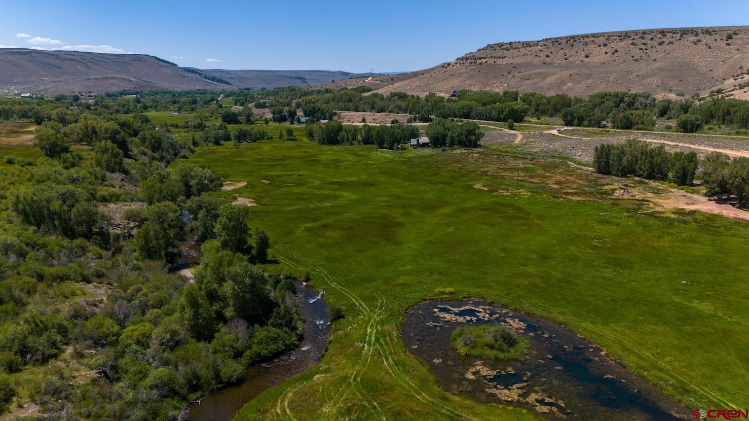 32 Bench Road Parlin, CO 81239 - Photo 4 of 34 a view of a lake with a mountain in the background