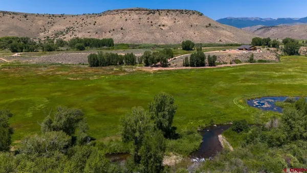 a view of an outdoor space with a lake view