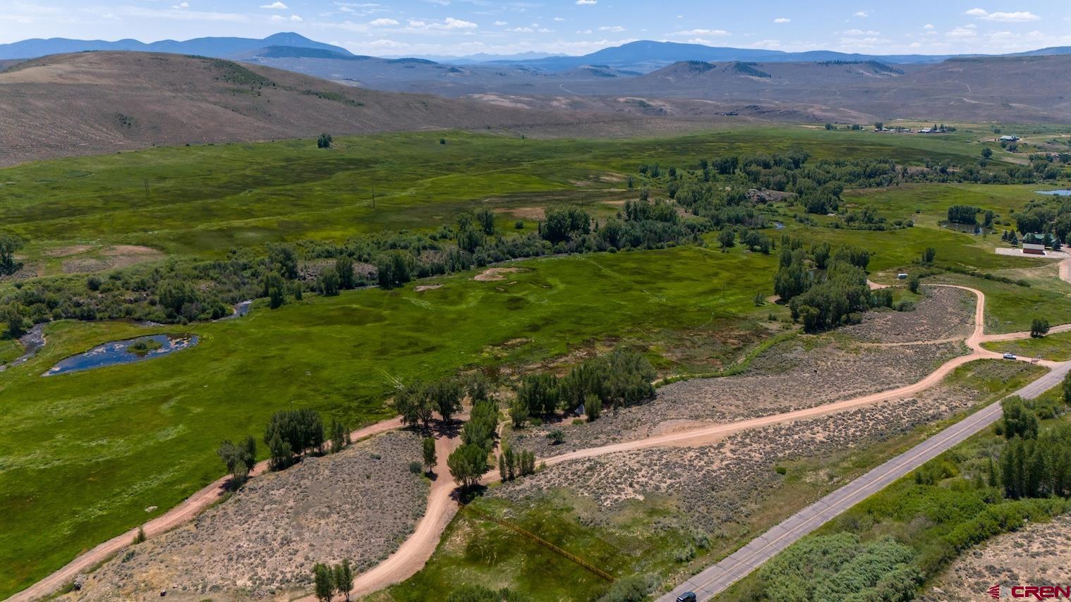 32 Bench Road Parlin, CO 81239 - Photo 9 of 34 a view of a lush green hillside and houses