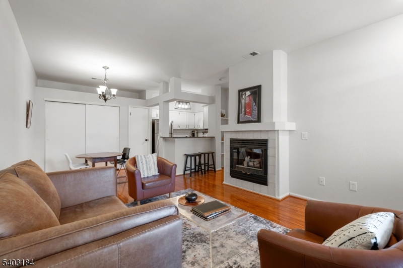 3 Wescott Road Bedminster, NJ 07921 - Photo 4 of 15 a living room with furniture and a fireplace