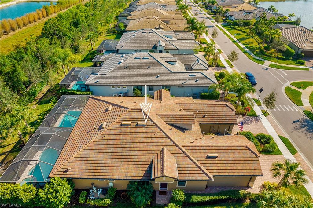 7674 Jacaranda Lane Naples, FL 34114 - Photo 27 of 45 an aerial view of a house