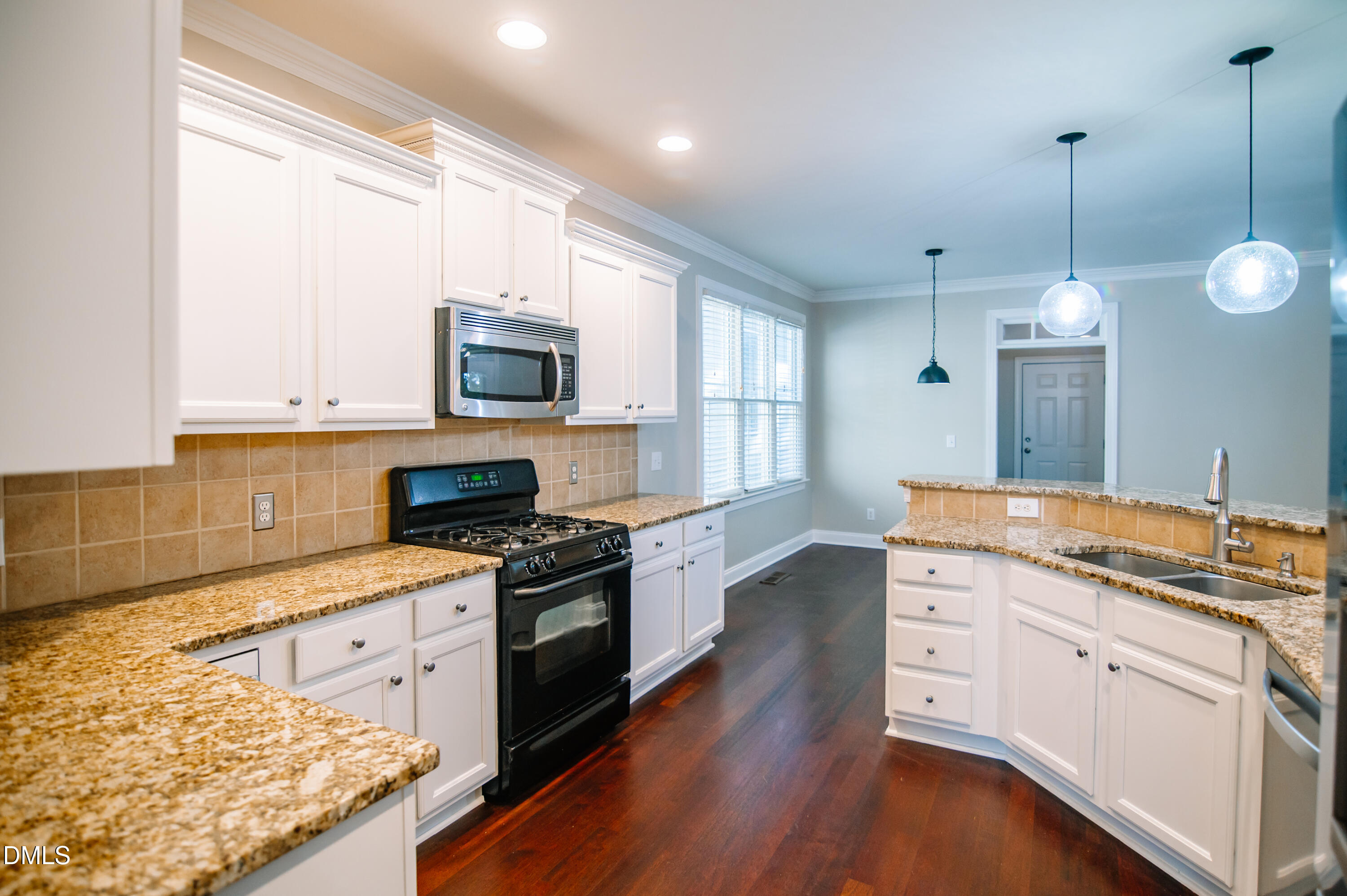 2106 Cloud Cover Lane Raleigh, NC 27614 - Photo 4 of 35 a kitchen with a stove oven and a granite counter tops