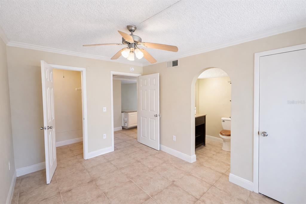 125 Water Front Way, Unit 110 Altamonte Springs, FL 32701 - Photo 11 of 17 wooden floor in an empty room and a bathroom