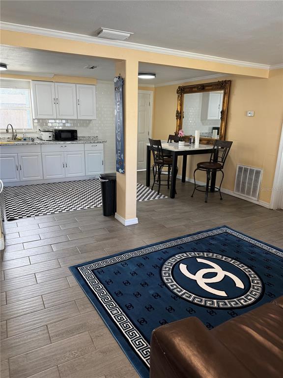 4550 Abdella Lane Holiday, FL 34690 - Photo 11 of 41 a kitchen with a appliances and cabinets