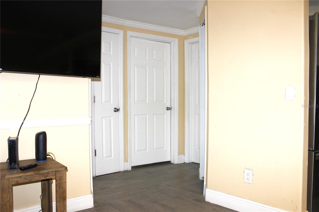 4550 Abdella Lane Holiday, FL 34690 - Photo 13 of 41 a view of front door with wooden floor