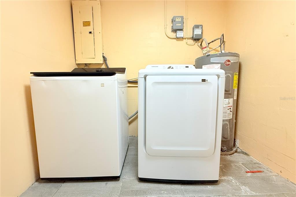 4550 Abdella Lane Holiday, FL 34690 - Photo 29 of 41 a utility room with dryer and washer