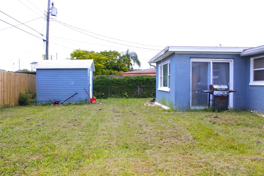 4550 Abdella Lane Holiday, FL 34690 - Photo 33 of 41 front view of a house with a yard