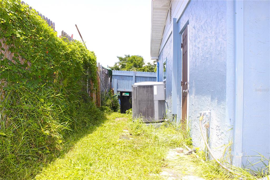 4550 Abdella Lane Holiday, FL 34690 - Photo 35 of 41 a view of a house with a yard