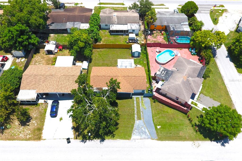 4550 Abdella Lane Holiday, FL 34690 - Photo 36 of 41 an aerial view of a house with a swimming pool