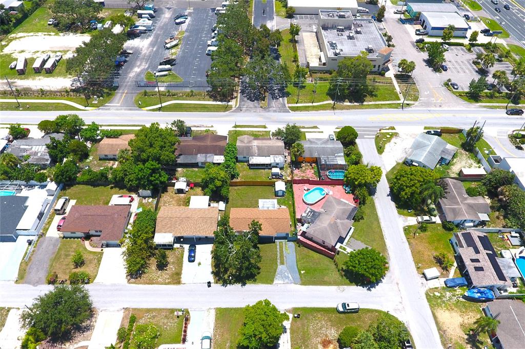 4550 Abdella Lane Holiday, FL 34690 - Photo 37 of 41 an aerial view of residential houses with outdoor space and swimming pool