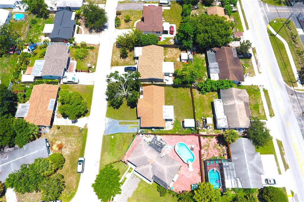 4550 Abdella Lane Holiday, FL 34690 - Photo 38 of 41 an aerial view of residential houses with outdoor space and parking