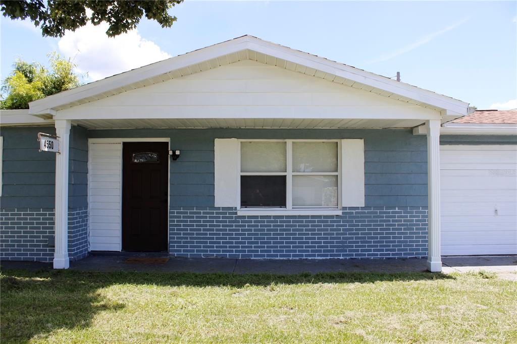 4550 Abdella Lane Holiday, FL 34690 - Photo 5 of 41 a view of a house with backyard