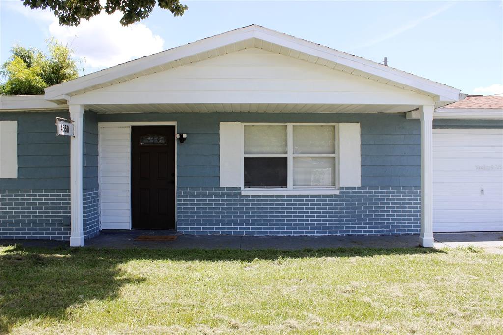 4550 Abdella Lane Holiday, FL 34690 - Photo 6 of 41 a view front of house with yard