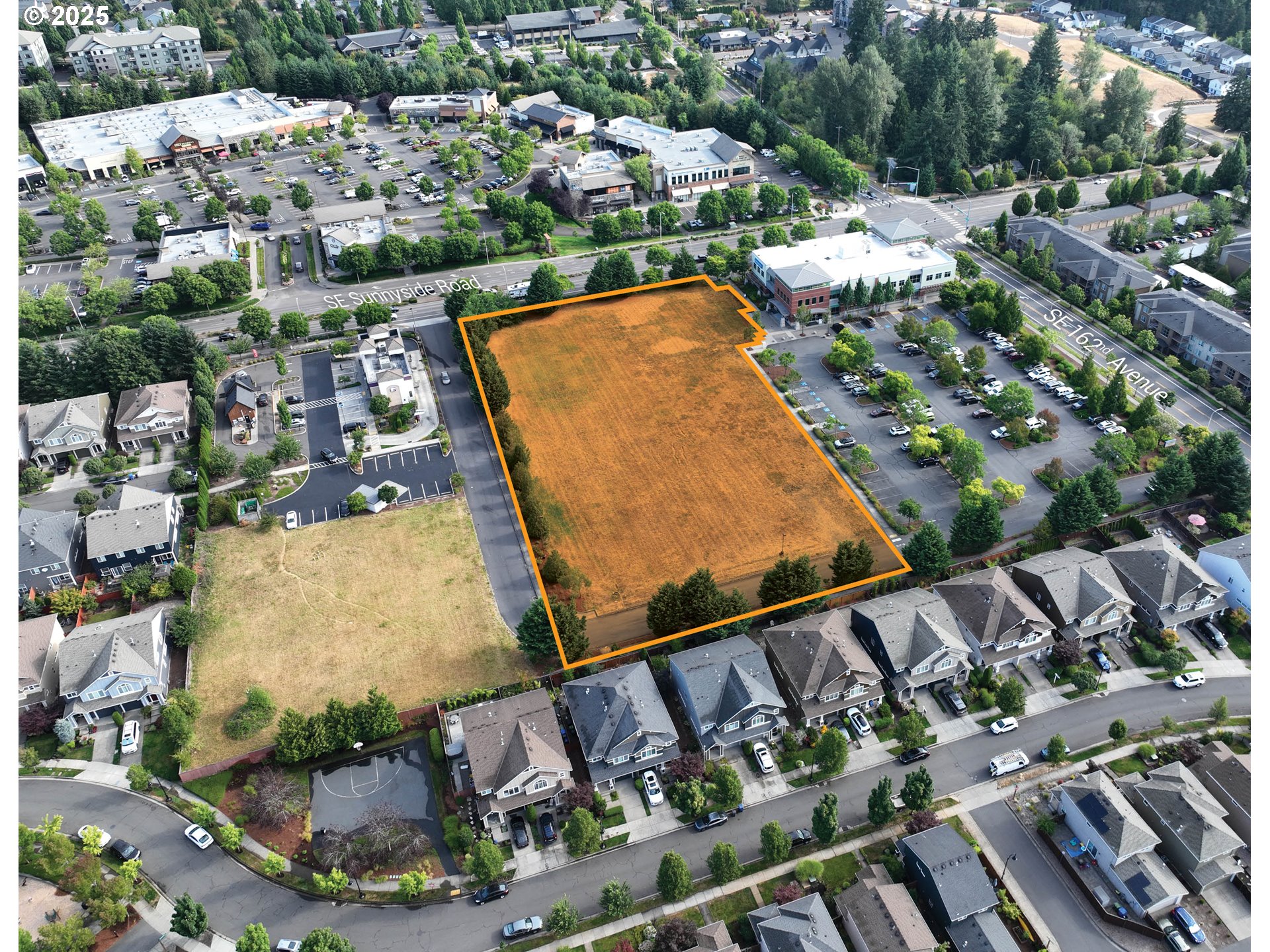 16180 Southeast Sunnyside Road Happy Valley, OR 97015 - Photo 2 of 4 a view of a swimming pool from a balcony
