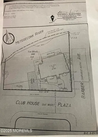 a house that has a tree in front of it