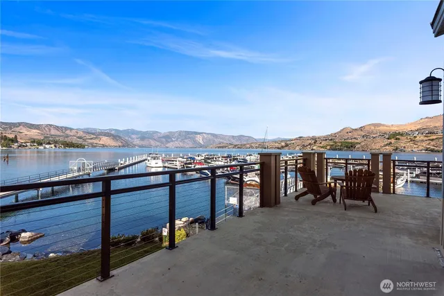 a view of a chairs and table in patio