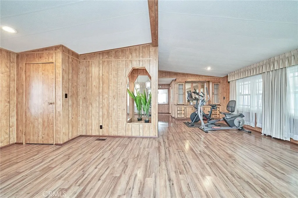 17701 Avalon, Unit 372 Carson, CA 90745 - Photo 18 of 32 a view of a room with wooden floor and furniture