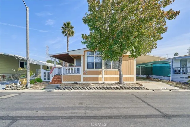 a house with a bench in front of it