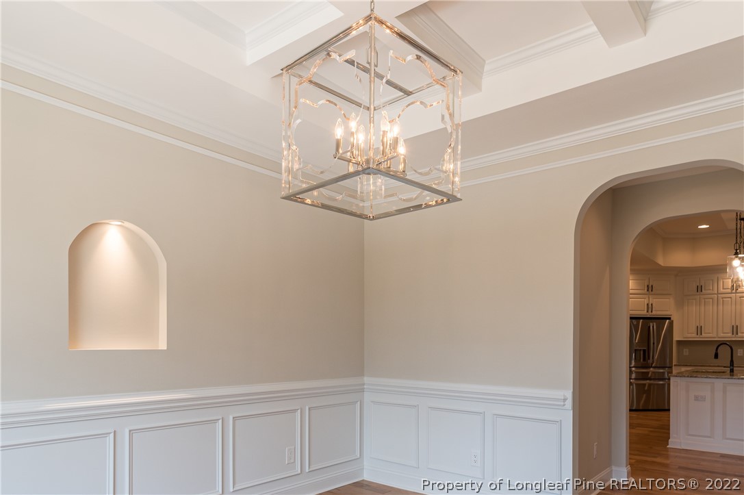 193 Kirk Road Aberdeen, NC 28315 - Photo 15 of 49 a view of a chandelier fan and entryway