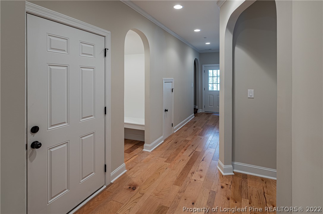 193 Kirk Road Aberdeen, NC 28315 - Photo 29 of 49 a view of a hallway with wooden floor