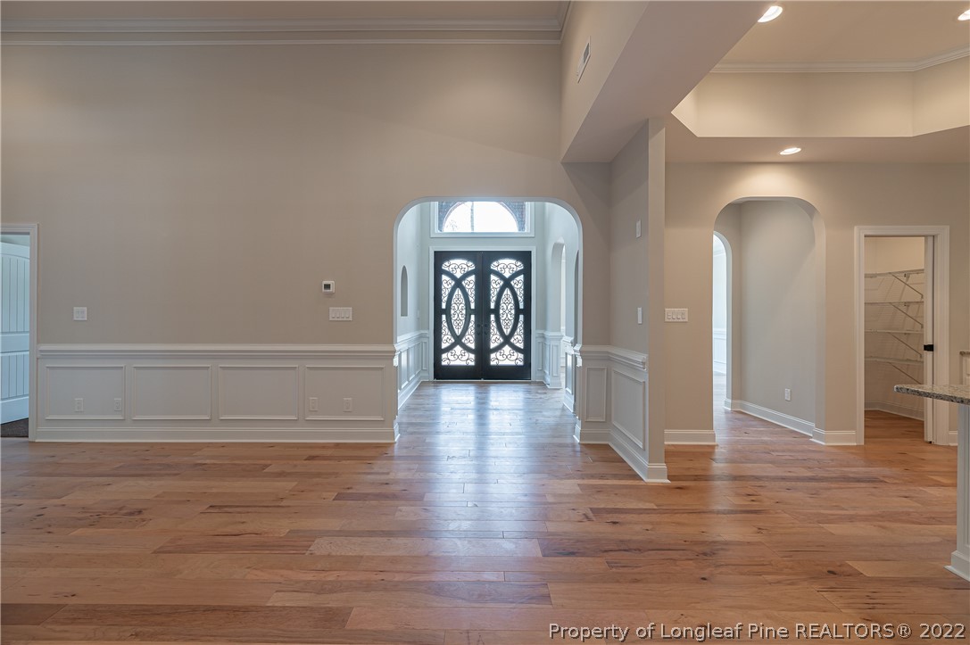 193 Kirk Road Aberdeen, NC 28315 - Photo 5 of 49 a view of a hallway with wooden floor