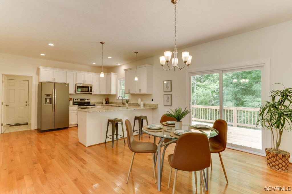 10907 New Town Road New Kent, VA 23124 - Photo 11 of 30 Dining area featuring plenty of natural light, lig