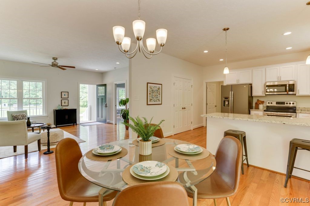 10907 New Town Road New Kent, VA 23124 - Photo 12 of 30 Dining area with light wood-type flooring, recesse