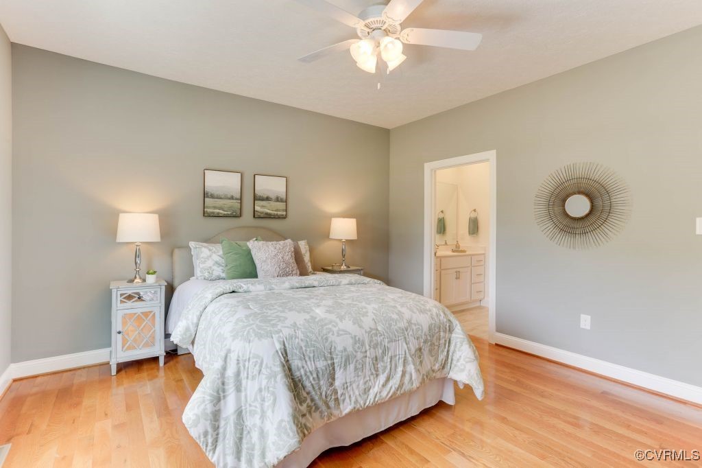 10907 New Town Road New Kent, VA 23124 - Photo 4 of 30 Bedroom with baseboards, light wood-style floors,