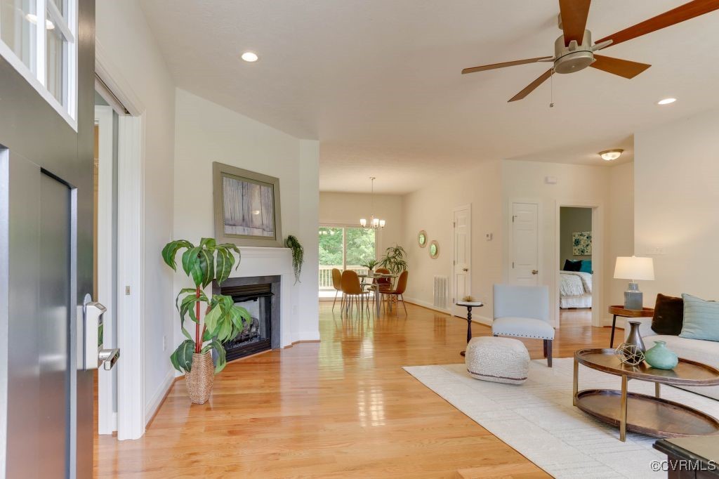 10907 New Town Road New Kent, VA 23124 - Photo 6 of 30 Living room featuring light wood-type flooring, a