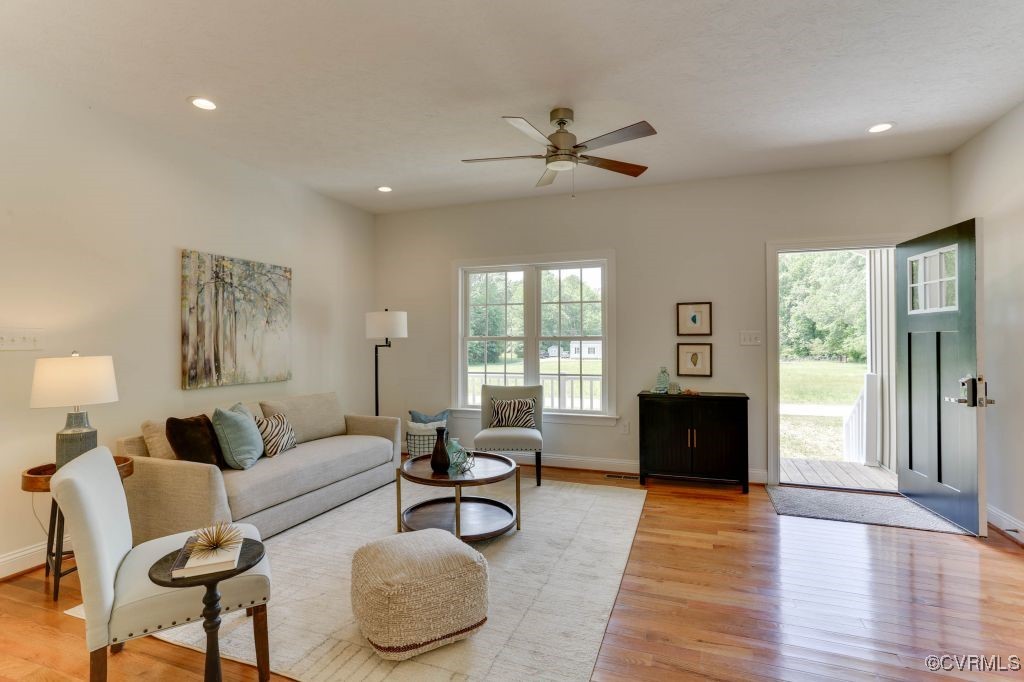 10907 New Town Road New Kent, VA 23124 - Photo 9 of 30 Living area featuring ceiling fan, light wood-styl