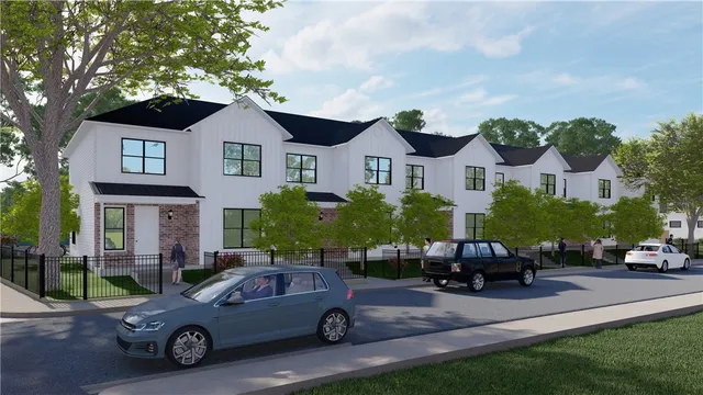 a car parked in front of a house