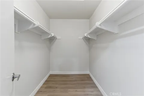 a view of an empty walk in closet