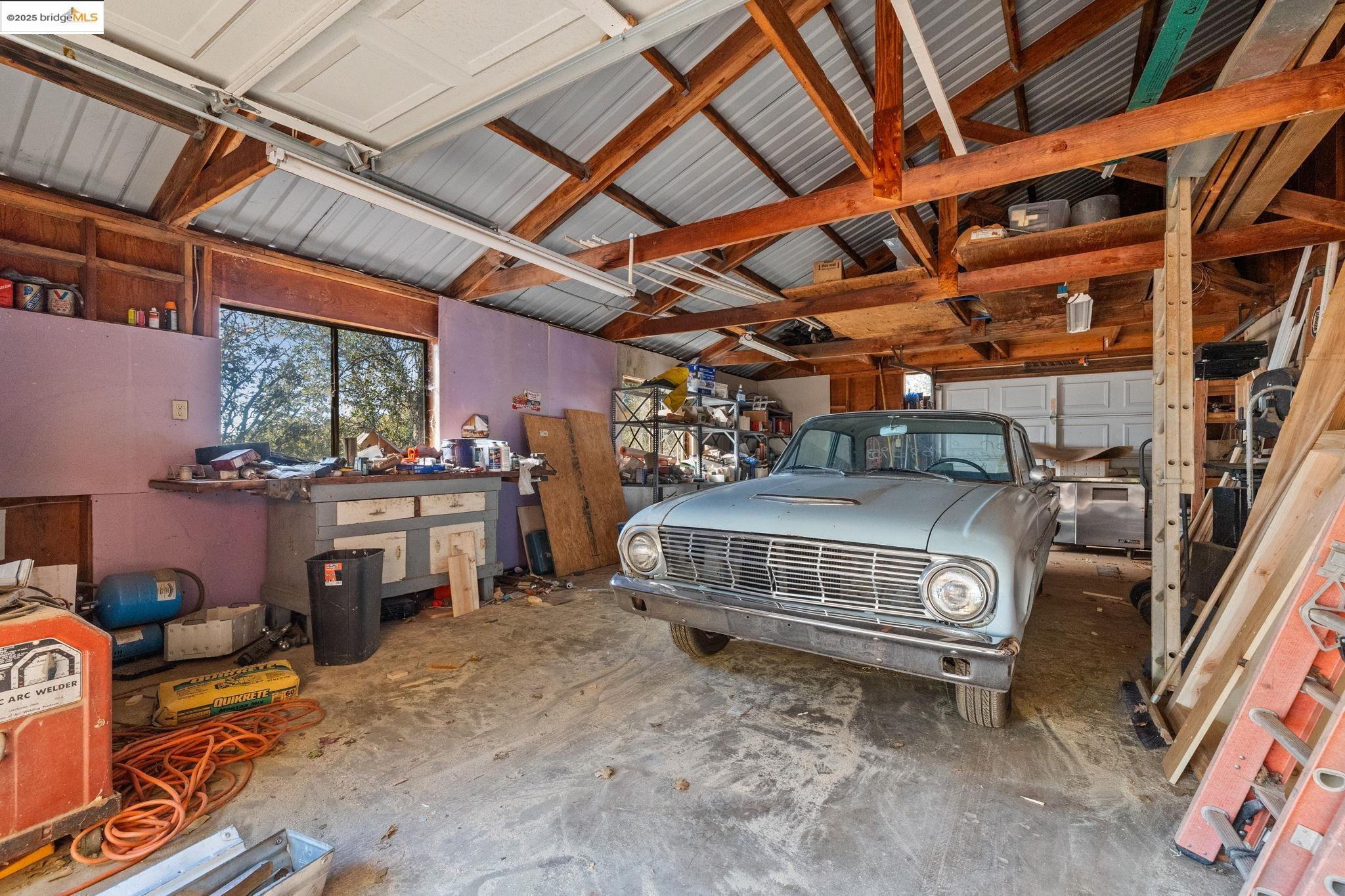 16144 Big Hill Road Sonora, CA 95370 - Photo 37 of 59 Inside. Roll up doors both sides
