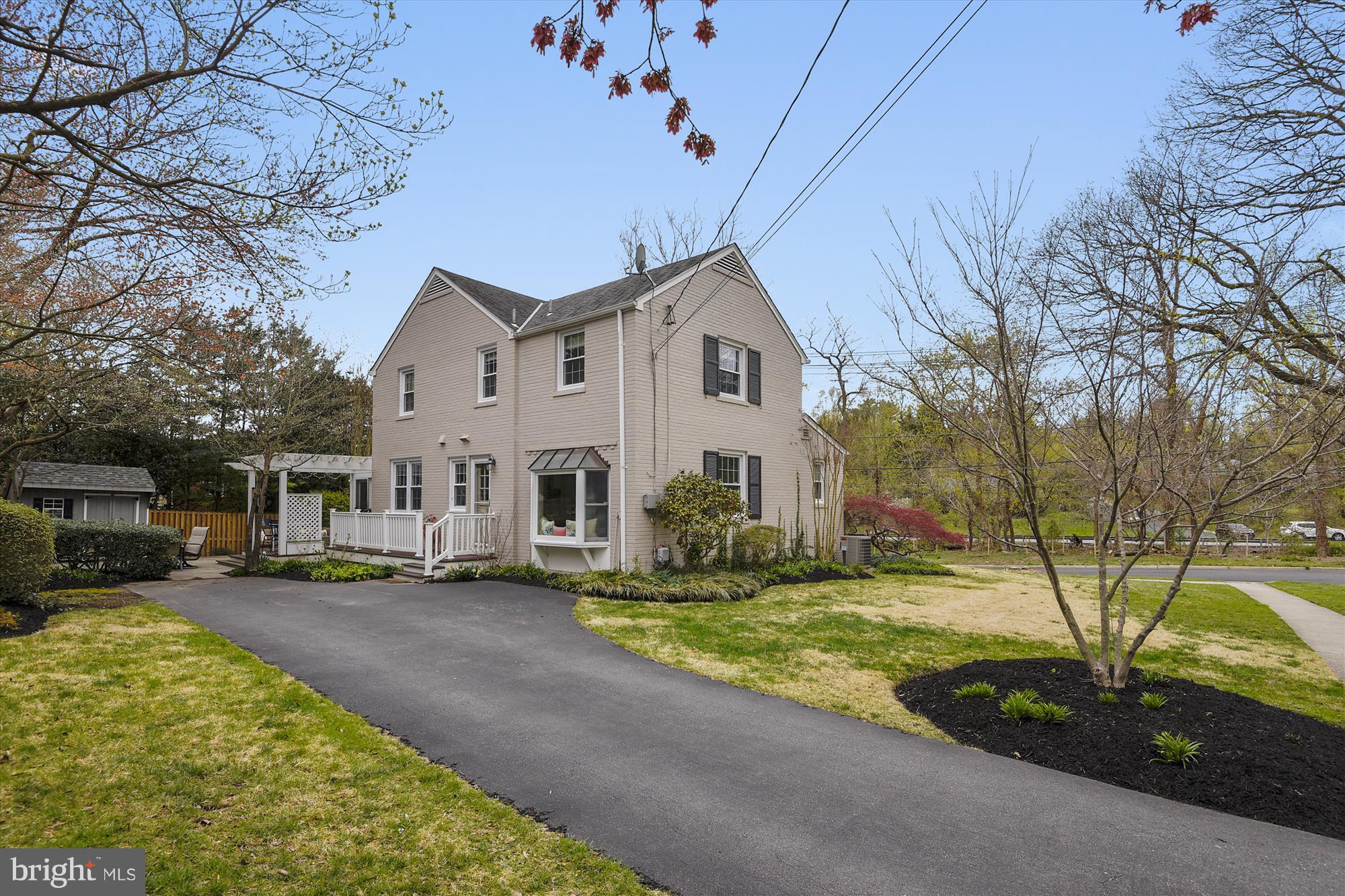 6121 Ramsgate Road Bethesda, MD 20816 - Photo 2 of 30 Extended driveway offers room to park several cars
