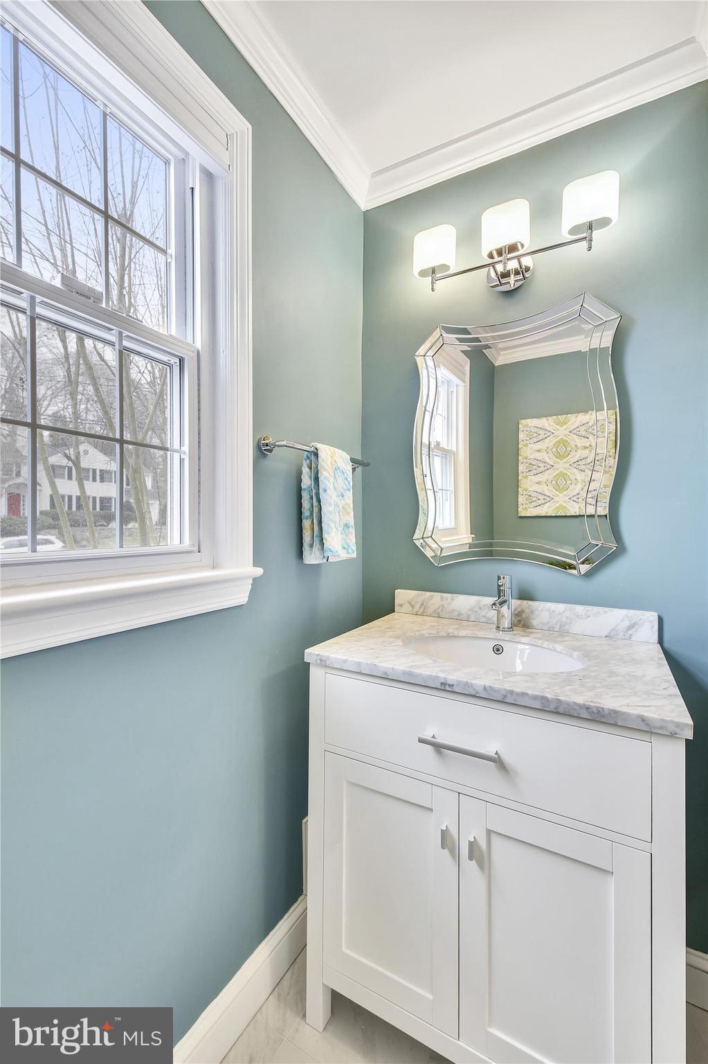6121 Ramsgate Road Bethesda, MD 20816 - Photo 14 of 30 Renovated powder room on main level