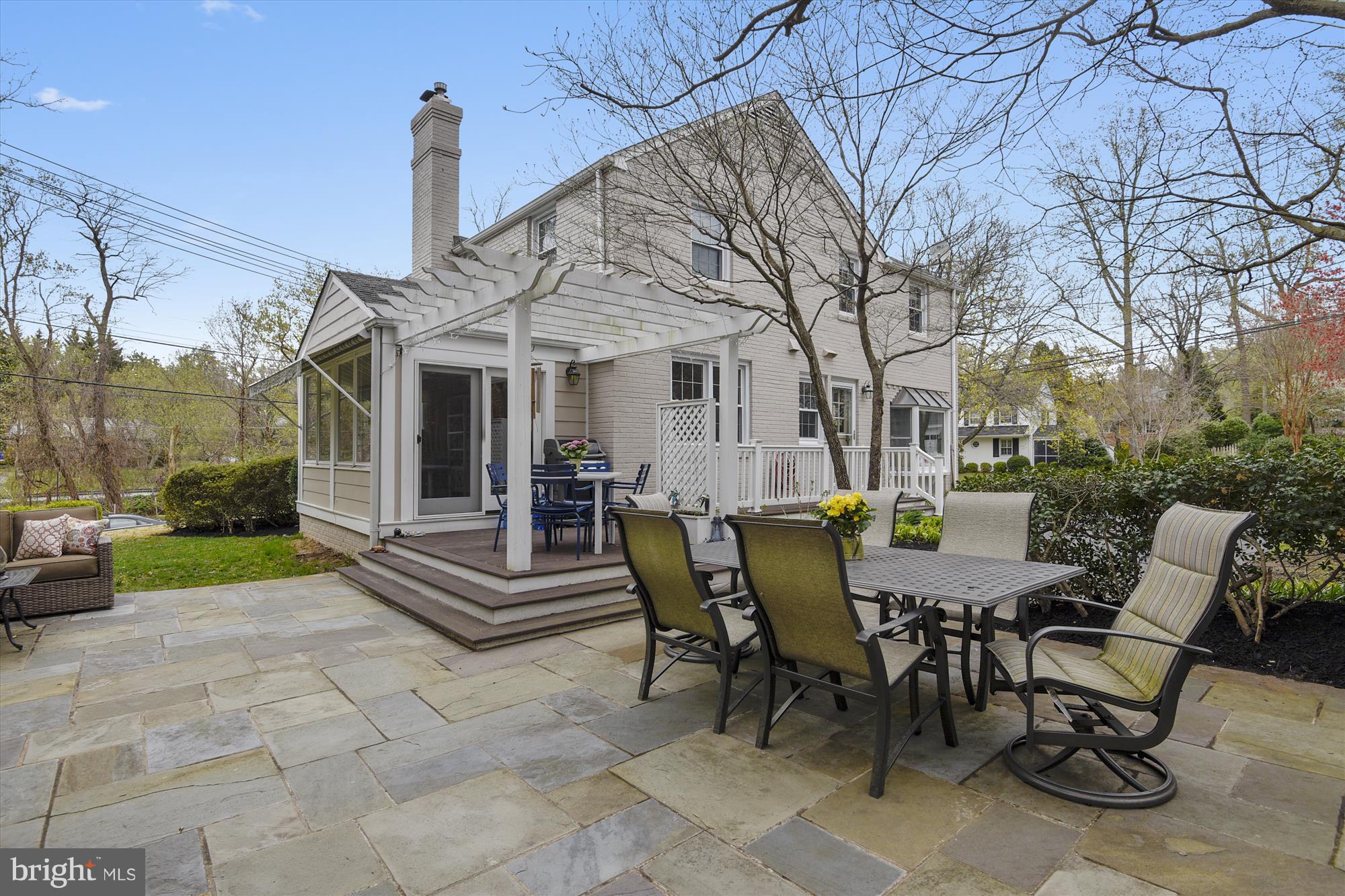 6121 Ramsgate Road Bethesda, MD 20816 - Photo 3 of 30 New flagstone patio adjacent to deck w/pergola