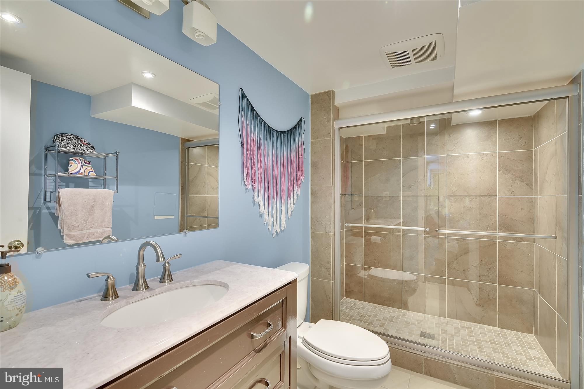 6121 Ramsgate Road Bethesda, MD 20816 - Photo 28 of 30 Lower Level Bathroom is also fully renovated